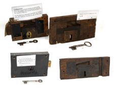 A 19th Century Oak-Cased Plate Lock, finished black, the bolt stamped PATENT 8265, with original key