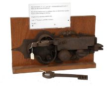 An Iron Door Lock, German, probably late 17th century, with ornamented scrollwork of latch bar