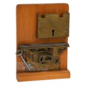 A Brass Seven Lever Safe Lock, top and bottom shoot by Dennis Buggins of C.H Buggins, Willenhall,
