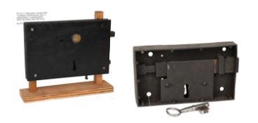 A Mid 19th Century Three Bolt Rim Lock, bearing brass label JOHN HARPER, with lift-up latch known as