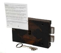 An Oak-Cased Stock Lock stamped John Shaw & Sons, mid 19th century 25cm by 16.5cm This particular