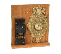 A George Price's Improved Patent Lock with Key, with decorative brass plaque numbered 212 with