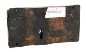 An Oak-Cased Plate Lock, early 18th century, with simple collar wards and decorative iron bands,