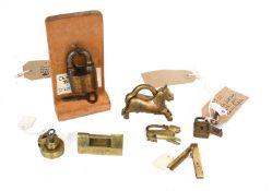 Six Assorted Brass Padlocks, to include: a small 19th century English brass padlock, with key