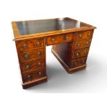 A Victorian burr walnut pedestal desk,