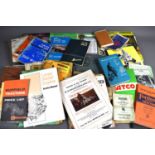 A collection of motoring related ephemera to include a 1956 Manx Grand Prix Programme of