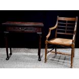 A 19th century mahogany tea table, with single drawer, carved edge to the folding top, cabriole legs