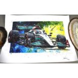 Formula 1 memorabilia: A George Russel signed art print of him driving his Mercedes AMG F1 W13 car