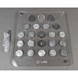 Formula 1 memorabilia: A Mercedes AMG F1 Team 2017 World Champions medal set, displayed in a perspex