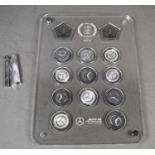 Formula 1 memorabilia: A Mercedes AMG F1 Team 2018 World Champions medal set, displayed in a perspex