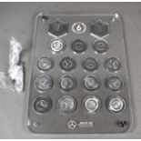Formula 1 memorabilia: A Mercedes AMG F1 Team 2019 World Champions medal set, displayed in a perspex