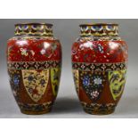 A pair of Japanese Meiji period cloisonne vases, decorated with flowers, butterflies and birds, 25cm