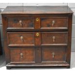 A late 17th / early 18th century oak chest of drawers, the rectangular top above an arrangement of