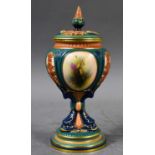 A late Victorian Hadley's Worcester pot pourri vase, with handpainted panels of flowers, the urn