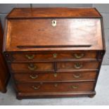 A Queen Anne period Anglo-Chinese padouk and huanghuali wood writing bureau, the fall front encloses