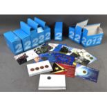 A group of Portuguese "Coins of The Month" collection, each coin is on its own display card and from