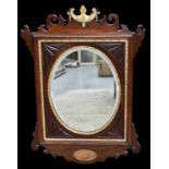 A 19th century Chippendale style mahogany and gilt mirror with fan carved corner spandrels, with