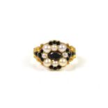 A Georgian 18ct gold, pearl and black stone mourning ring, the back engraved Mrs Susanna Lane, 5th