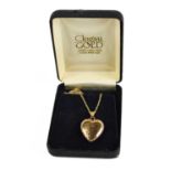 A 9ct Clogau Gold Welsh locket pendant necklace, the heart form locket engraved with flowers, on a