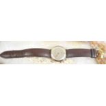 A 9ct gold cased Tudor Rolex wristwatch, the signed silvered dial with Arabic and baton markers,
