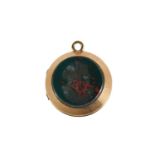 A gold and intaglio locket pendant, set with carnelian and green agate depicting profile