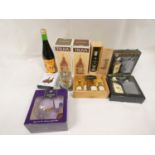 Group of boxed malt whisky and liqueur miniatures, to include two 10cl gift backs of The Famous
