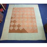 Victorian pieced patchwork quilt, the polkadot café au lait cotton ground with six rows of basket