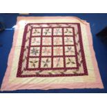 Victorian pieced patchwork bedspread in predominantly pink, cream and blue floral and plain