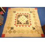 Victorian pieced "Diamond in the Square" patchwork quilt in plain and floral cottons with plain