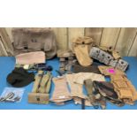 A Collection of military pouches, beret's, Black Hawk Ambidextrous drop leg holster used by S.F. WW2