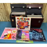 Two record boxes containing a selection of mixed genre LP Records.