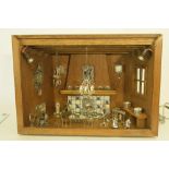 Miniatuurkamer met zilveren miniaturen