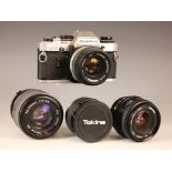 An Olympus OM10 35mm SLR camera, fitted with an Olympus OM-System Zuiko MC Auto-S 1:1,8 f=50mm lens;
