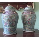 A pair of Chinese porcelain baluster vases and covers, Peranaken or Straits market, 19th century,