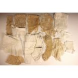 A late 19th century flounce of ecru net with tambour decoration, approximately 450cm x 14cm; with