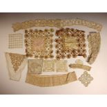 Two Tenerife-work mats, each 22cm x 22cm, and a quantity of lace mats, trimmings, etc (Qty)