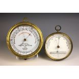 A Dollond Fishermans Aneroid Barometer issued by the Royal National Life Boat Institution, of