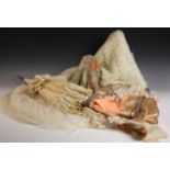 An early lady’s floral shawl, 20th century, with metallic thread detail and fringe to four sides,