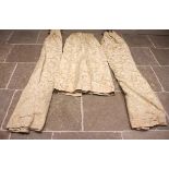 A pair of ivory coloured floral jacquard fabric interlined curtains with plain white backing, drop