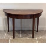 A Regency mahogany D-end console table, the satinwood strung top with lip gallery, raised on four