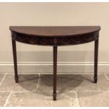 A George III Adam style mahogany demi-lune console table, with swag moulding to the frieze and