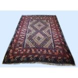 Persian rug, 325 x 210 cm.