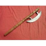 Indo-Persian battle axe On a replacement turned wooden shaft, 605 mm long. Face of the axe, 270