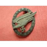 WW2 German Luftwaffe Fallschirmjager badge Later war period two part zinc badge. Flat-back wreath.
