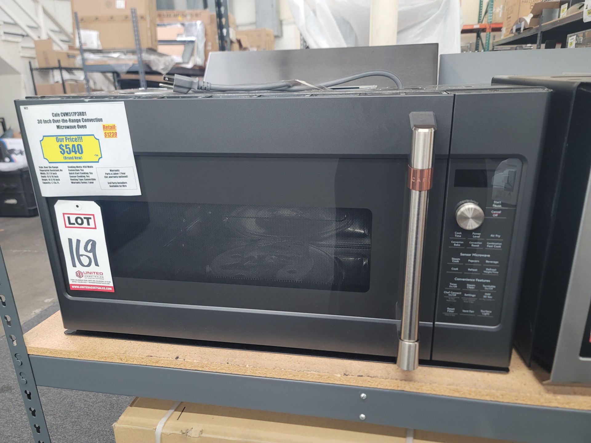 CAFE 30" OVER-THE-RANGE CONVECTION MICROWAVE OVEN IN BLACK MATTE W/ STAINLESS STEEL HANDLE, 1.7