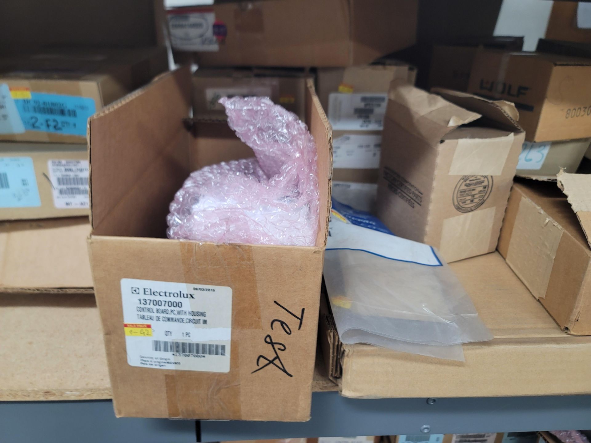 LOT - 8' SHELF UNIT W/ CONTENTS OF APPLIANCE REPLACEMENT PARTS - Image 10 of 19