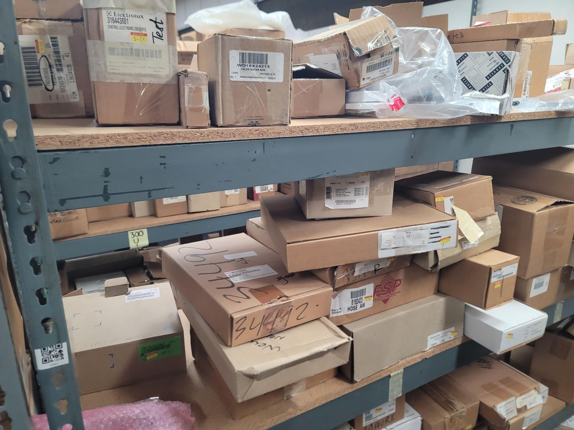 LOT - 8' SHELF UNIT W/ CONTENTS OF APPLIANCE REPLACEMENT PARTS - Image 17 of 21