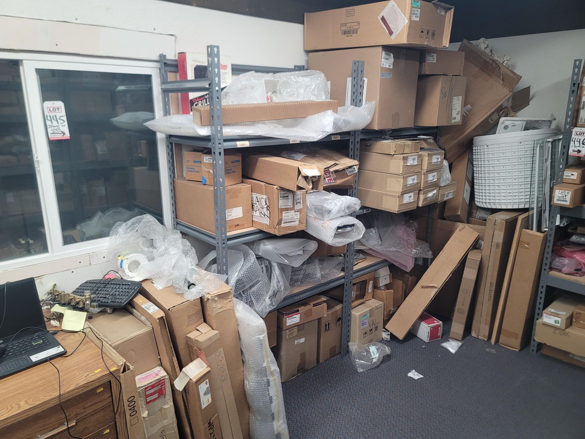 LOT - ALL ITEMS ON WALL INCLUDING CORNER, W/ (2) SHELF UNITS FILLED W/ APPLIANCE REPLACEMENT PARTS