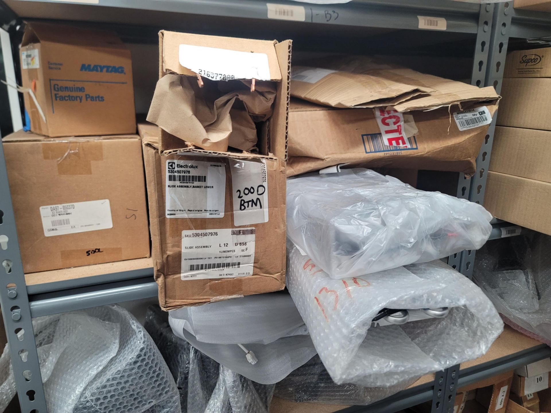 LOT - ALL ITEMS ON WALL INCLUDING CORNER, W/ (2) SHELF UNITS FILLED W/ APPLIANCE REPLACEMENT PARTS - Image 7 of 15