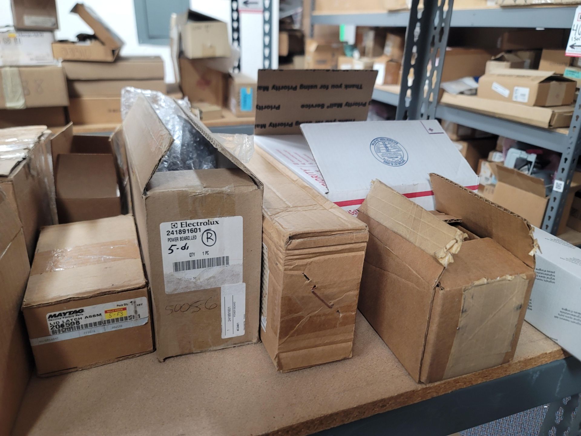 LOT - 8' SHELF UNIT W/ CONTENTS OF APPLIANCE REPLACEMENT PARTS - Image 11 of 19